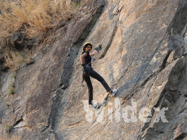Rock Climbing at Camp Wildex Rishikesh, same rock-face is used for rappelling activity